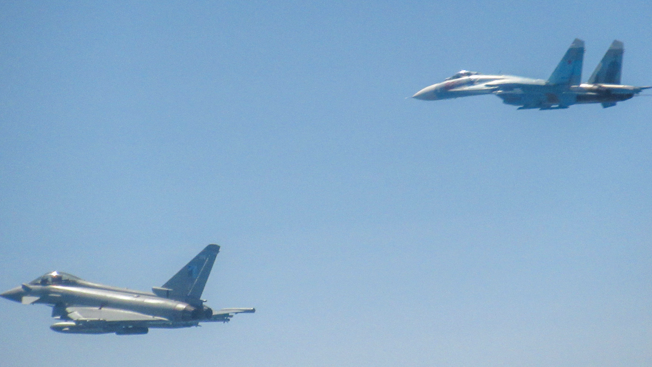 An RAF Typhoon flying alongside a Russian Su27 Flanker on 22 June CREDIT RAF 270623.jpg