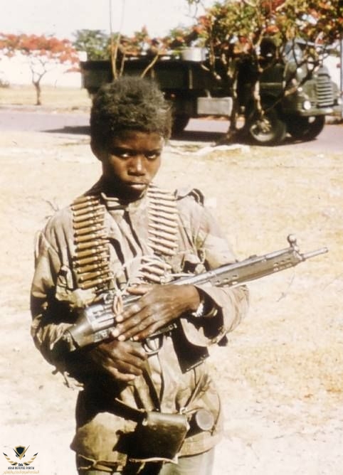 African Child Soldier W_ A G3 Rifle (1970s).jpeg