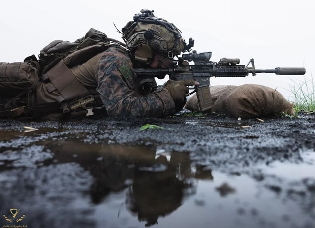 u-s-marine-corps-lance-cpl-christian-ferguson-fires-an-m4-v0-6u54pgab5clb1.jpg