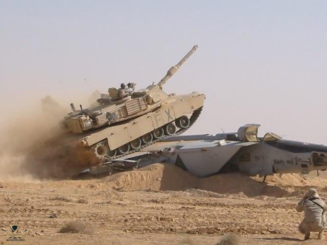 abrams-tank-running-over-a-mig-in-iraq-v0-zyedgpujk68a1.jpg