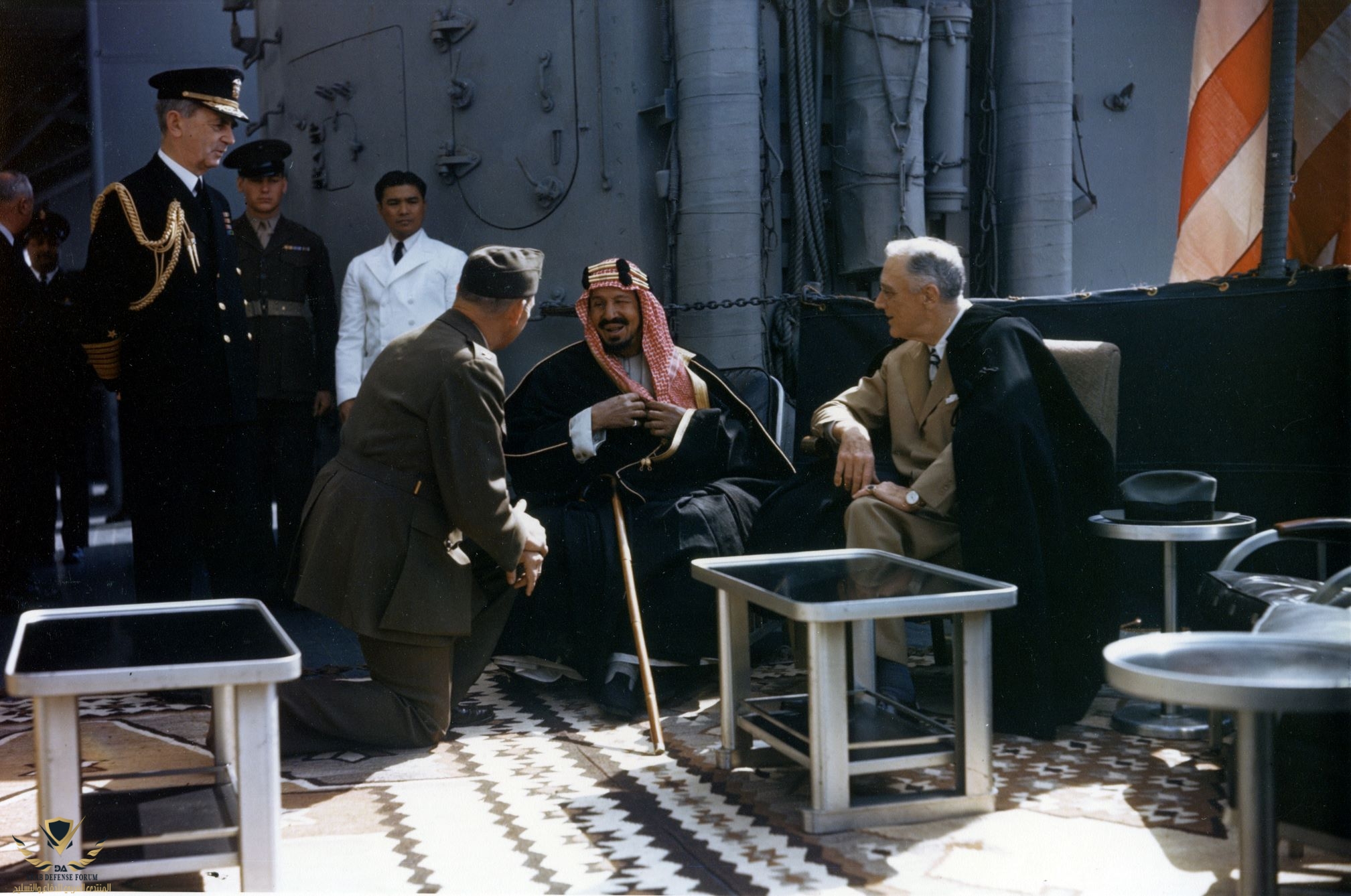 Franklin_D._Roosevelt_with_King_Ibn_Saud_aboard_USS_Quincy_(CA-71),_14_February_1945_(USA-C-545).jpg