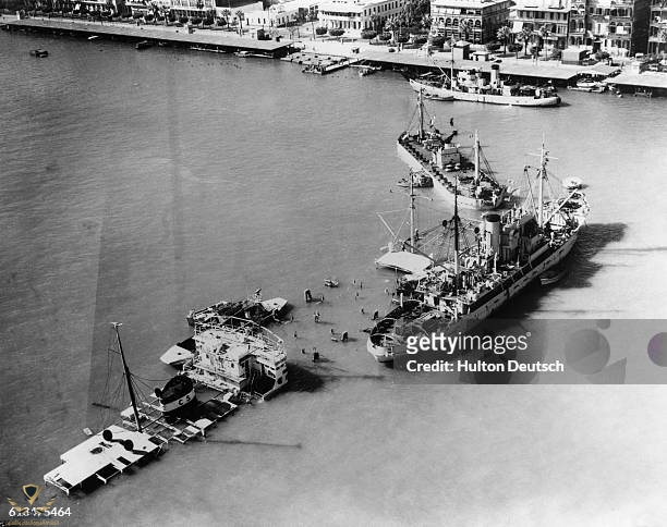 the-suez-crisis-seen-from-the-air-the-block-ships-which-have-been-sunk-in-the-entrance-to-the.jpg
