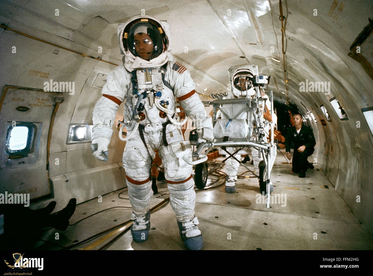 nasa-apollo-14-astronauts-alan-b-shepard-jr-left-pulls-the-modular-FFM2HG.jpg