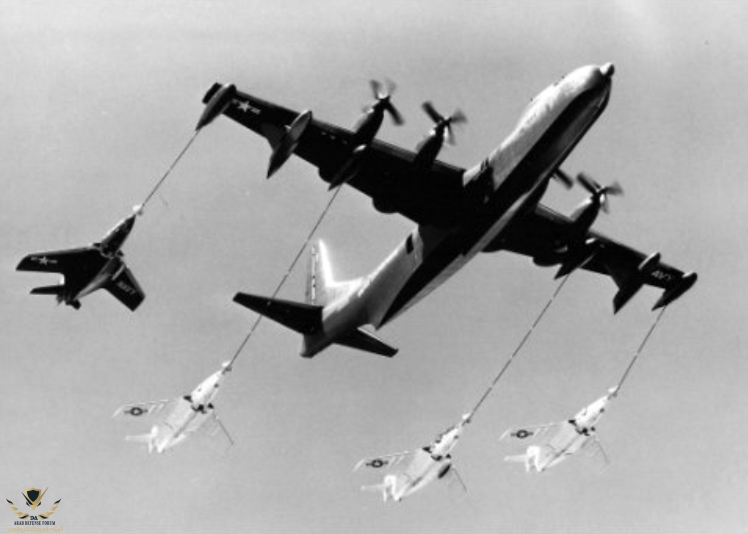 Convair_R3Y-2_refueling_four_F9F-8s_1956.jpg