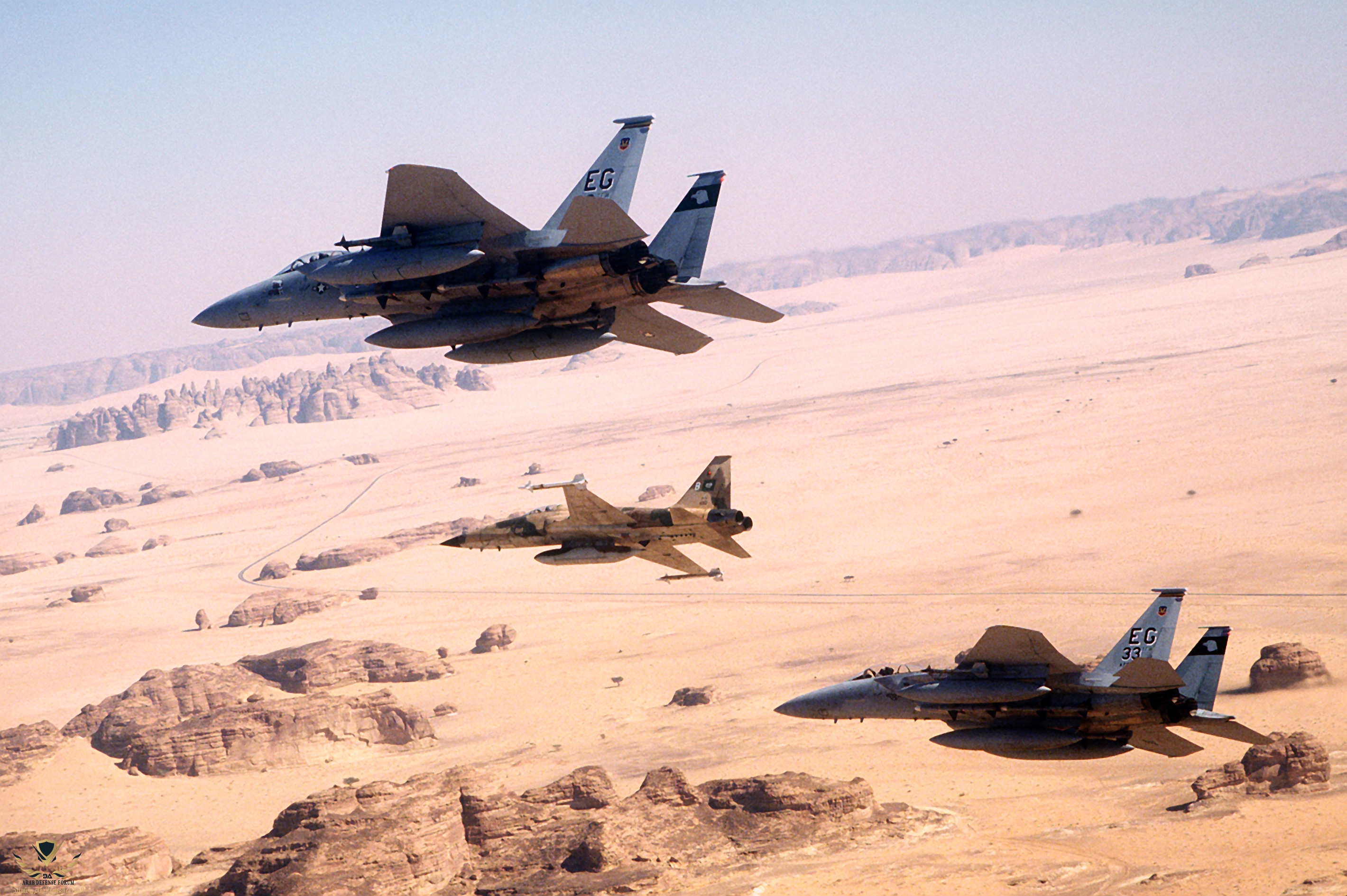 Two_F-15C_of_33rd_Tactical_Fighter_Wing,_and_a_Royal_Saudi_Air_Force_F-5E_Tiger.jpg