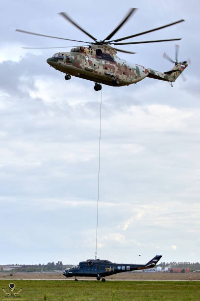 transport-helicopter-mi-26-t2b-transports-the-fuselage-of-a-combat-helicopter-on-the-external.jpg