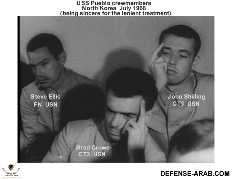 military-USS-Pueblo-captured-crew-giving-finger-2.jpg