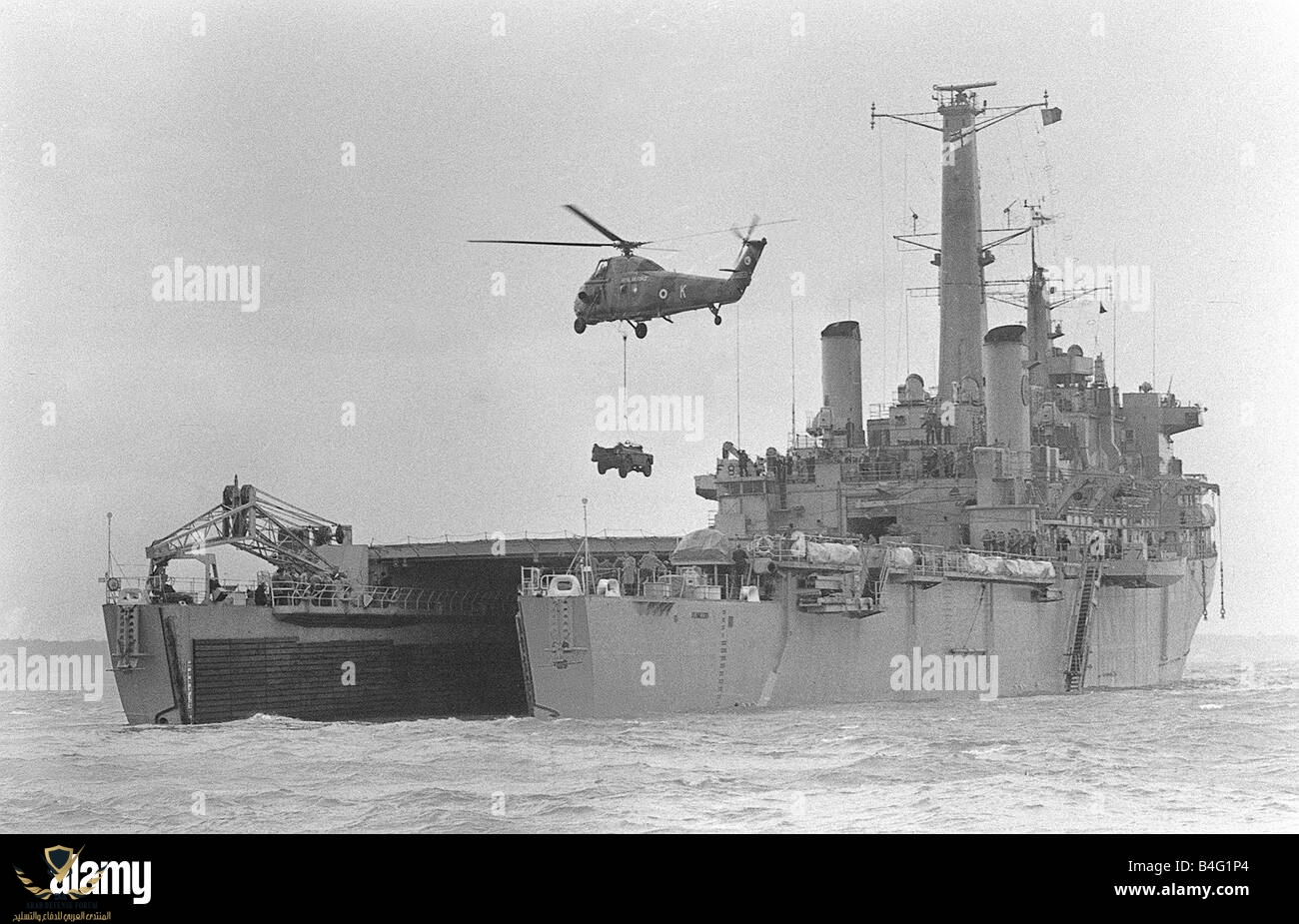 royal-navy-ships-hms-fearless-assault-ship-a-wessex-helicopter-hovers-B4G1P4.jpg
