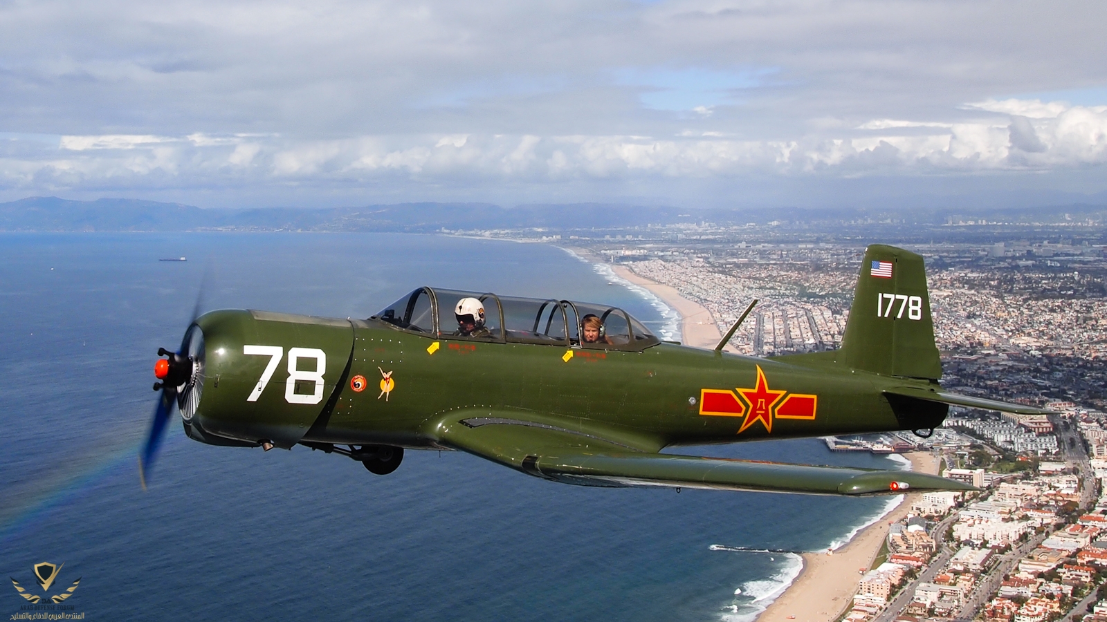 Nanchang_CJ-6A_Airplane_over_California_Coastline_N4183E_20110219.jpg