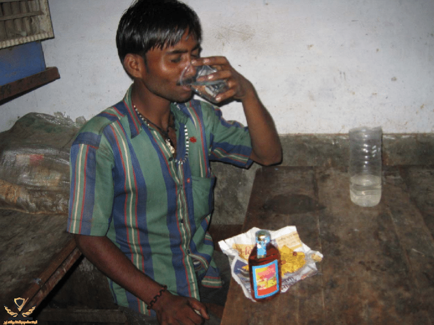 A-rickshaw-puller-drinking-early-in-the-morning-Government-approved-alcohol-shops-are.png