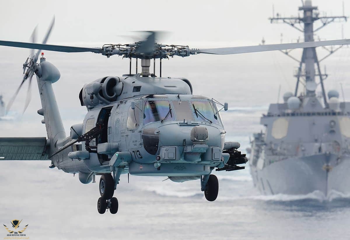 1200px-MH-60R_Sea_Hawk_helicopter_prepares_to_land_aboard_the_aircraft_carrier_USS_John_C._Ste...jpg