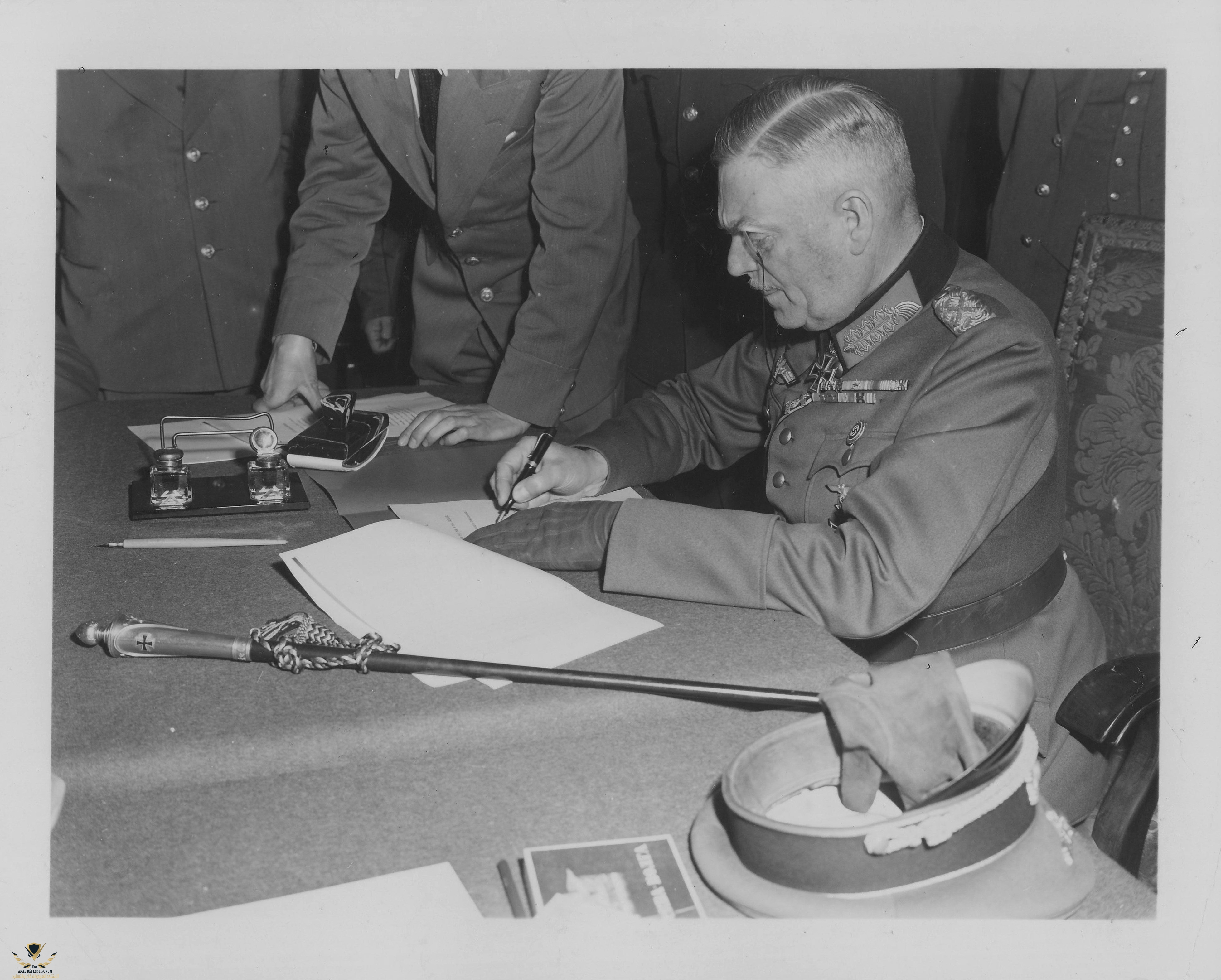 Field_Marshall_Keitel_signs_German_surrender_terms_in_Berlin_8_May_1945.jpg