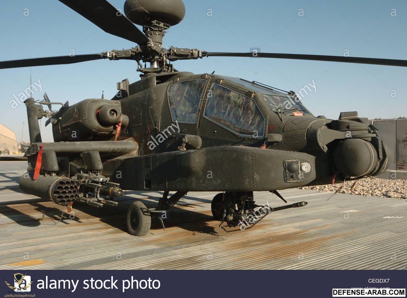 the-ah-64-apache-is-a-four-blade-attack-helicopter-with-reverse-tricycle-CEGDX7.jpg