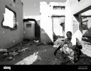 som-somalia-somaliland-a-man-in-the-ruins-of-his-house-destroyed-in-the-civil-war-in-hargeysa-...jpg