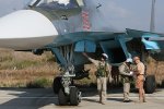 Performing_checks_on_Sukhoi_Su-34_at_Latakia,_Syria.jpg