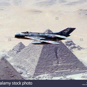 a-formation-of-egyptian-and-us-navy-aircraft-fly-over-one-of-the-great-HFCCHE.jpg