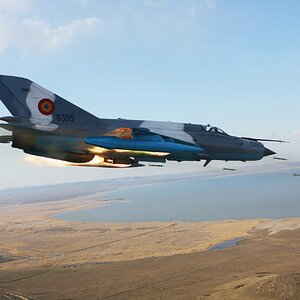 MiG-21_Lancer_C_firing_rockets-scaled.jpg