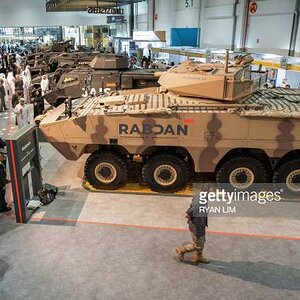 visitors-walk-near-the-rabdan-8x8-infantry-fighting-vehicle-at-the-edge-pavilion-during-the.jpg