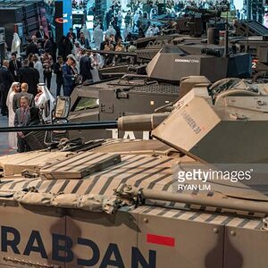 visitors-walk-near-the-rabdan-8x8-infantry-fighting-vehicle-at-the-edge-pavilion-during-the.jpg