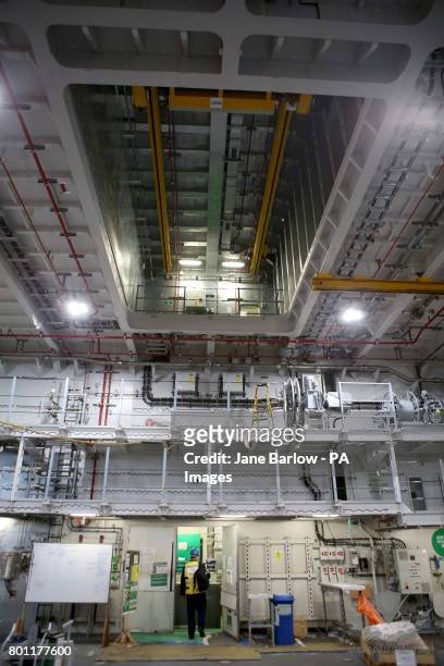 a-view-inside-the-main-hangar-below-the-flight-deck-ahead-of-sea-trials-this-summer-for-the.jpg