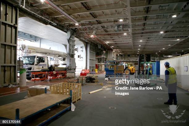 a-view-inside-the-main-hangar-below-the-flight-deck-ahead-of-sea-trials-this-summer-for-the.jpg