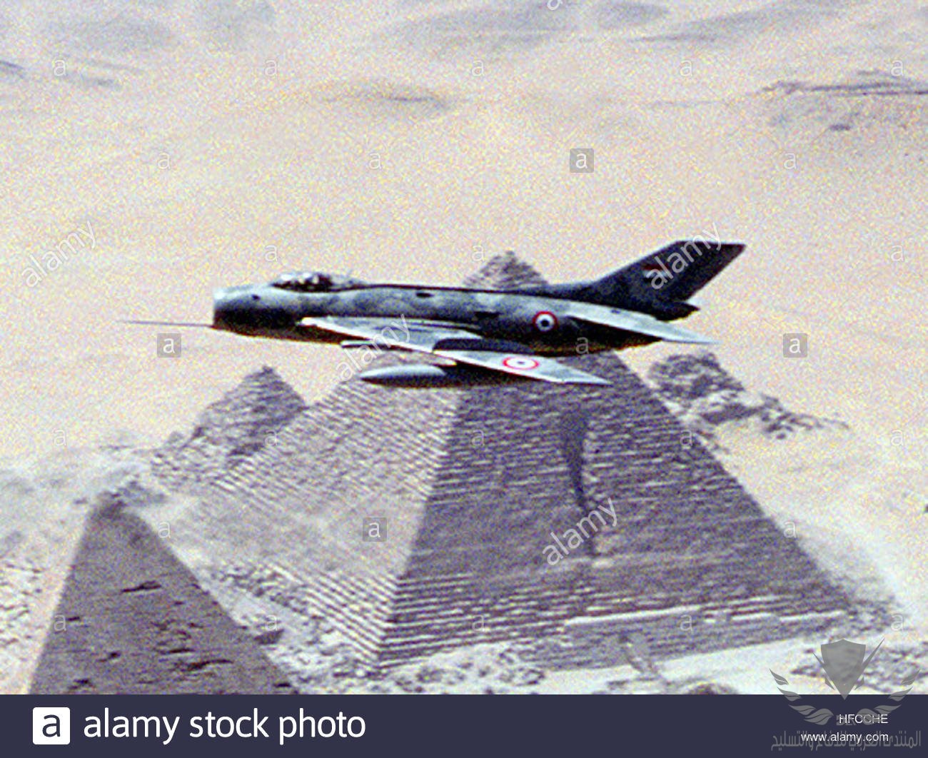 a-formation-of-egyptian-and-us-navy-aircraft-fly-over-one-of-the-great-HFCCHE.jpg