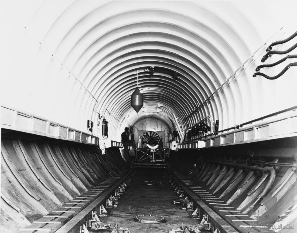 Japanese-Submarine-I-400-or-I-401-Interior-of-the-aircraft-hangar-showing-tracks-for-rolling-p...jpg