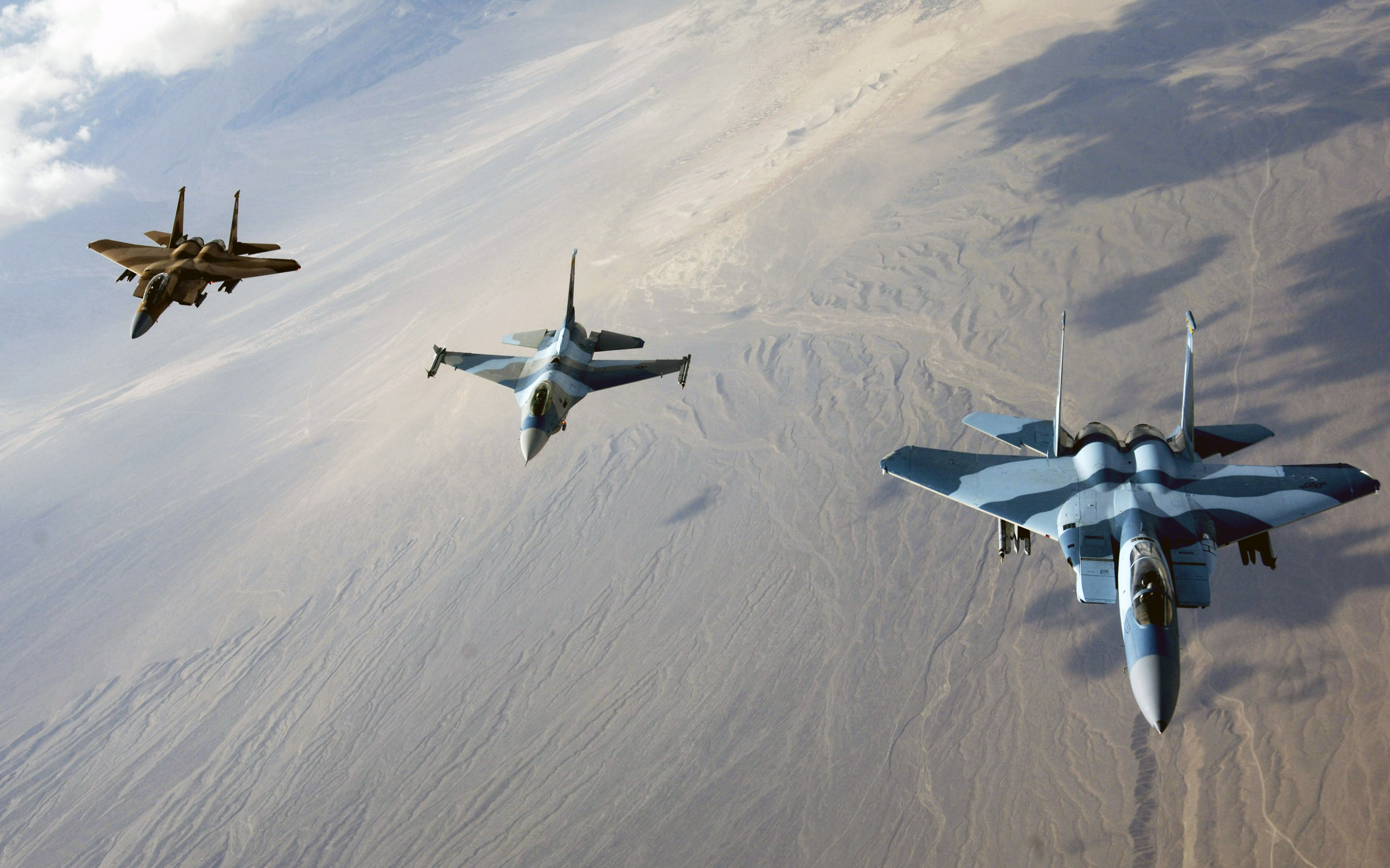 f_15_eagles_and_f_16_fighting_falcon-wide.jpg