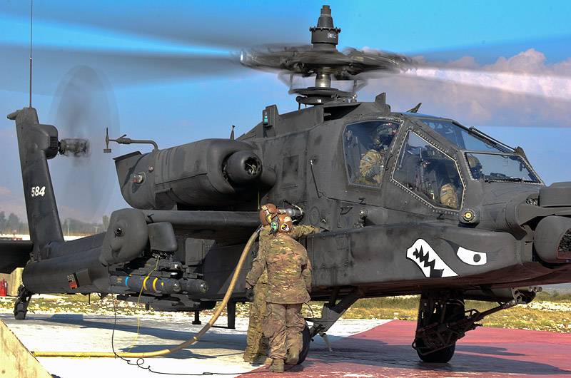 Fort-Campbell-159th-Combat-Aviation-Brigade-soldiers-refuel-an-Apache-Helicopter.jpg