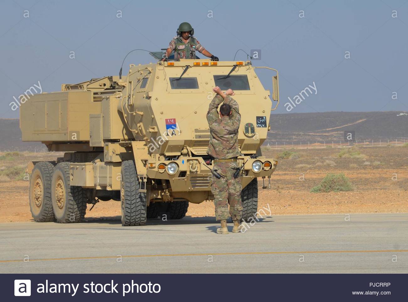 muwaffaq-salti-air-base-jordan-soldiers-with-the-us-armys-alpha-battery-1st-battalion-14th-field-artillery-regiment-and-the-jordanian-armys-29th-royal-himars-battalion-prepare-for-a-high-mobility-artillery-rocket-system-himars-live-fire-during-the-bi-lateral-lion-flight-training-exercise-on-july-23-2018-PJCRRP.jpg