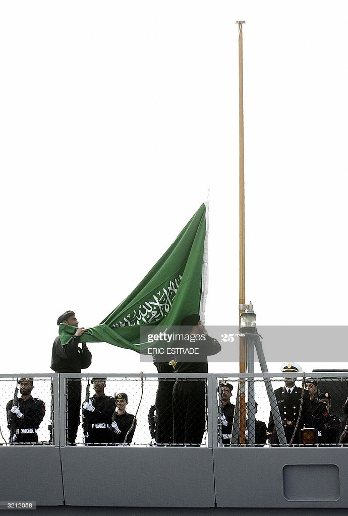 saudi-navy-marines-raise-the-saudi-flag-aboard-frigate-mecca-03-april-picture-id3212058