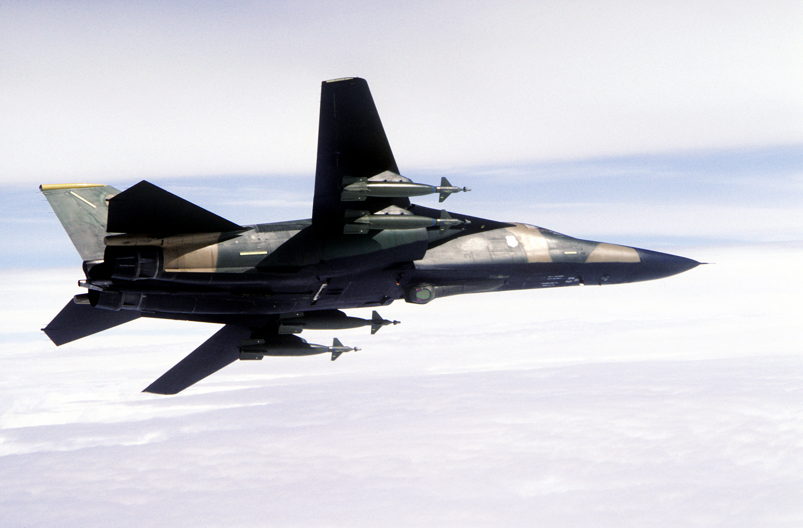 F-111F_493_TFS_with_Pave_Tack_and_GBU-10s_1982.JPEG