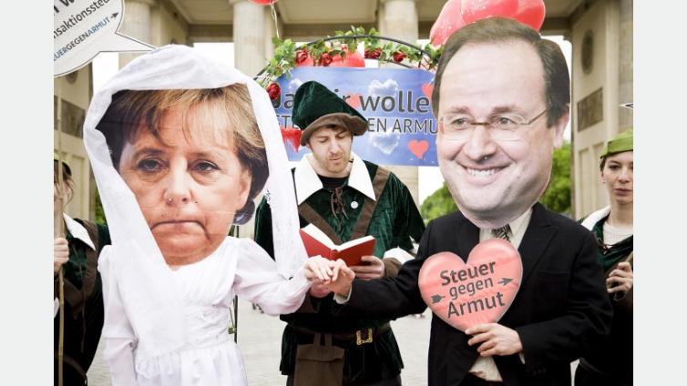 Merkel%20and%20Hollande%20wedding%20vows-%20A%20%E2%80%9Eyes%E2%80%9D%20for%20the%20Robin%20Hood%20Tax.JPG