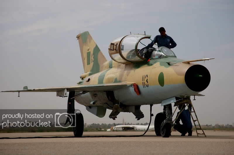 LibyaOct29-3107MiG-21UMcrewingup.jpg