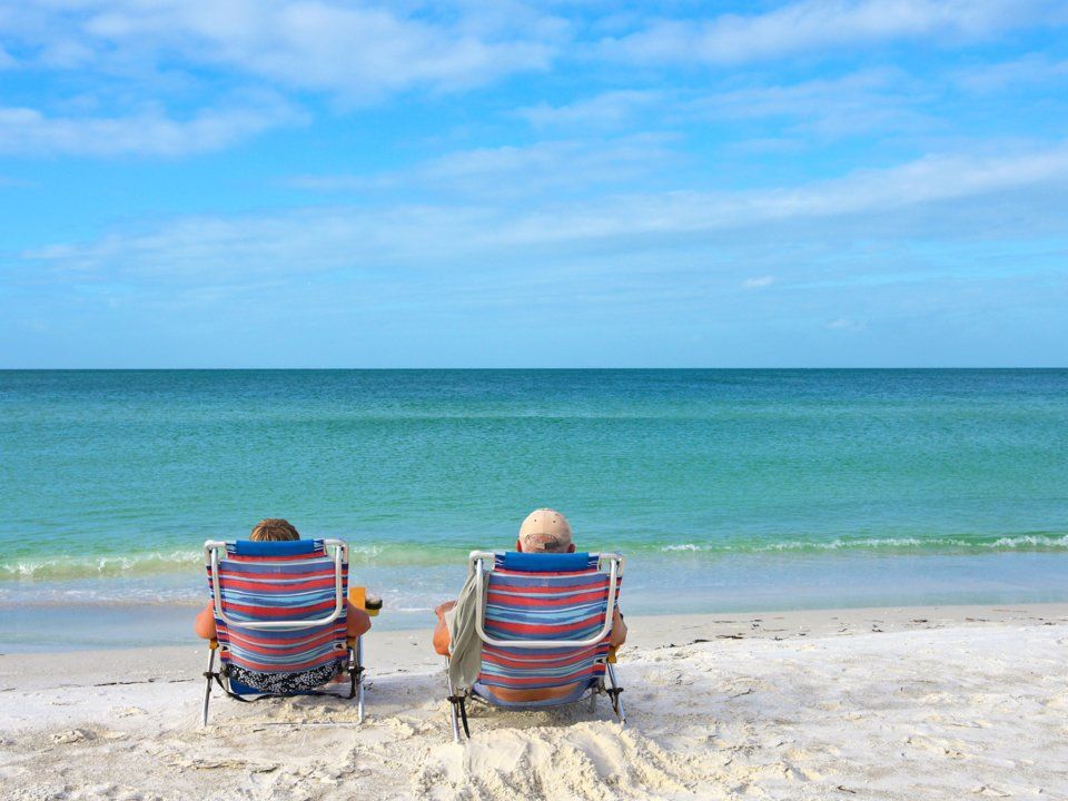 retired-couple-beach-1-960x720.jpg