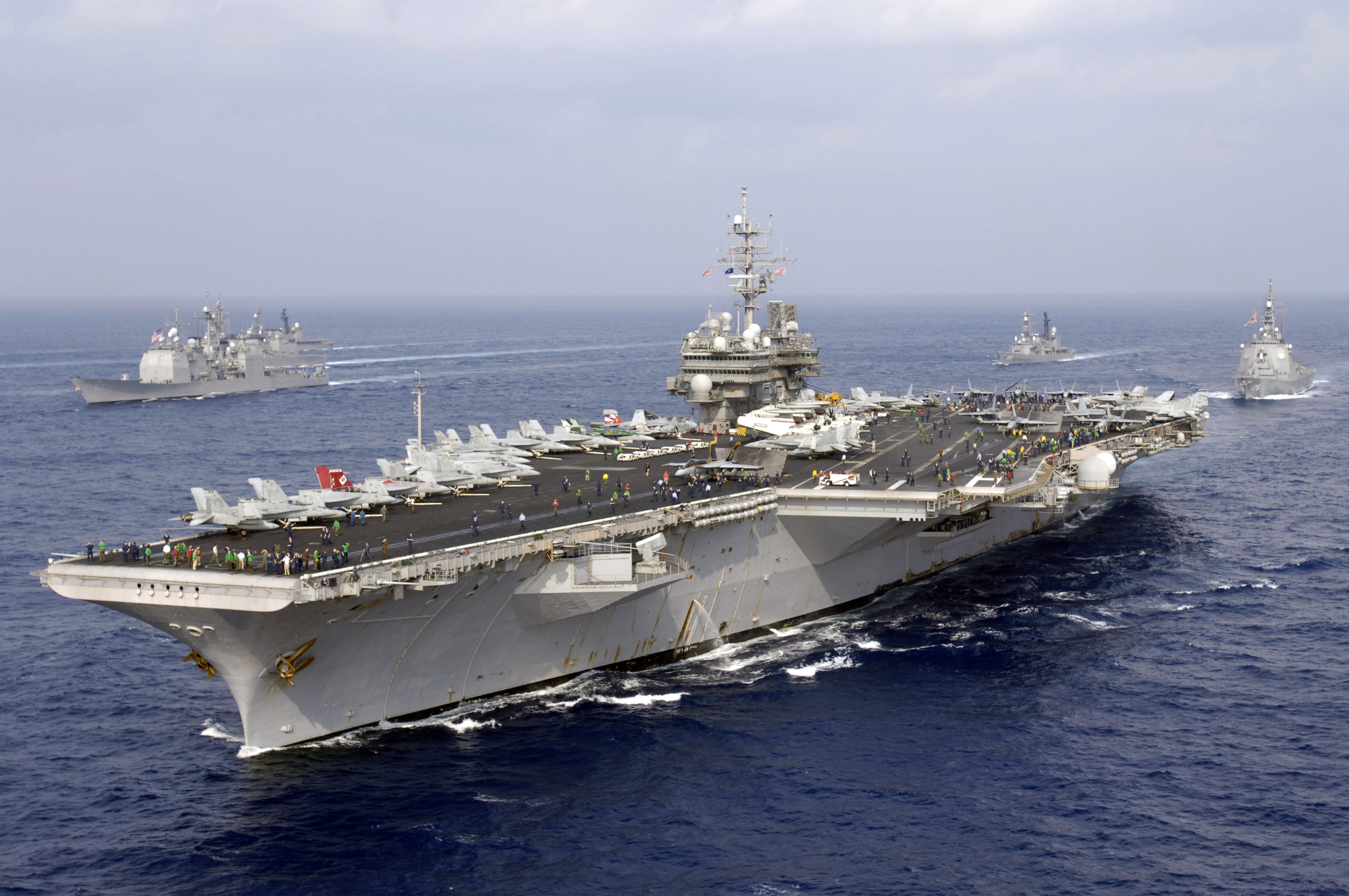 US_Navy_071116-N-7883G-101_The_aircraft_carrier_USS_Kitty_Hawk_%28CV_63%29_and_other_American_and_Japan_Maritime_Self-Defense_Forces_%28JMSDF%29_ships_transit_together_at_the_end_of_ANNUALEX_19G,_the_maritime_component_of_the_U.S.-Japa.jpg
