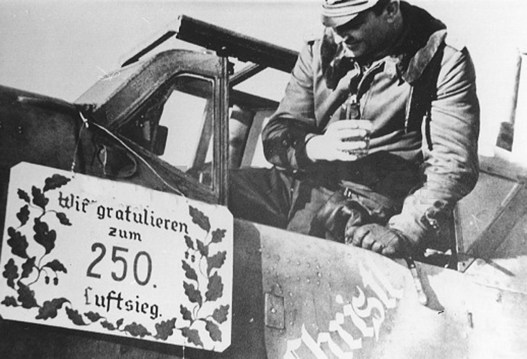 Aircrew-Luftwaffe-pilot-and-ace-Gerhard-Barkhorn-with-his-Messerschmitt-Bf-109-01.jpg