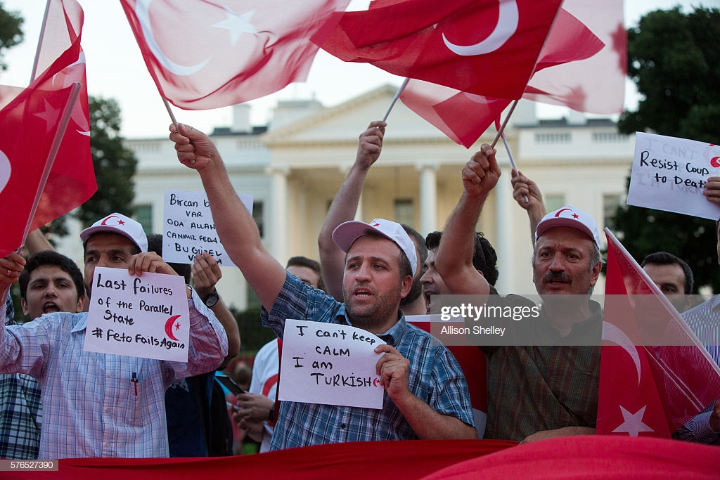 group-gathers-in-front-of-the-white-house-to-protest-the-coup-in-on-picture-id576527390