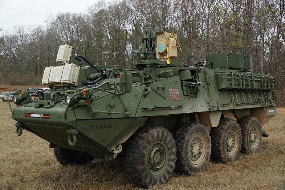 US_soldiers_ready_to_use_laser_weapon_MEHEL_mounted_on_Stryker_armored_925_001.jpg