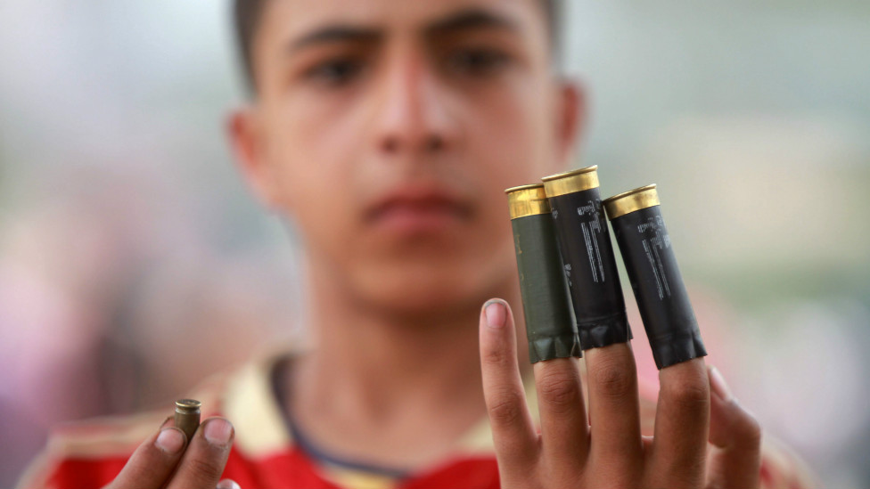 120502214603__egyptian_anti-military_protester_shows_spent_bullet_casings_during_clashes_in_the__976x549_afp_nocredit.jpg