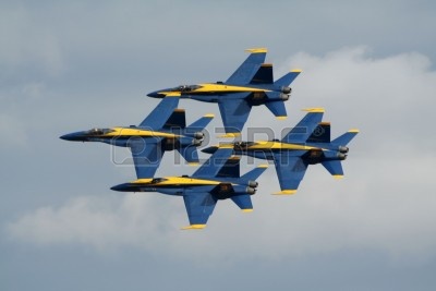 6897409-miramar-california-usa--october-15-us-navy-blue-angels-f-a-18-hornets-formation-flyby-at-miramar-air.jpg