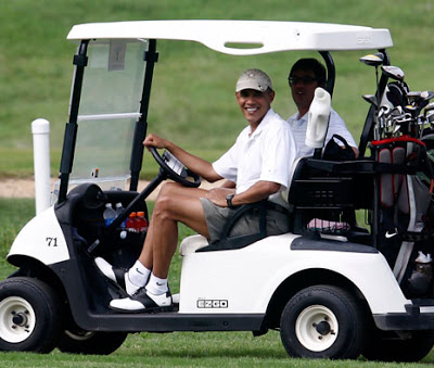 110616_obama_golf_cart_465_reut.jpg
