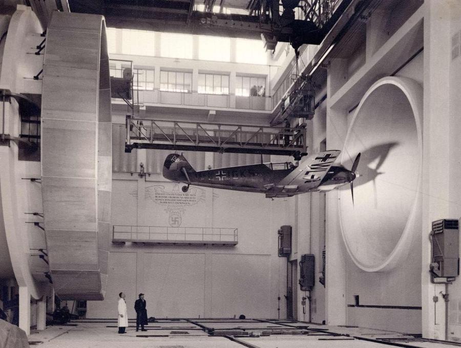 a-messerschmitt-bf-109-fighter-being-put-into-a-wind-tunnel-at-the-e2809chermann-goeringe2809d-aviation-research-institute-braunschweig-germany-1940.jpg