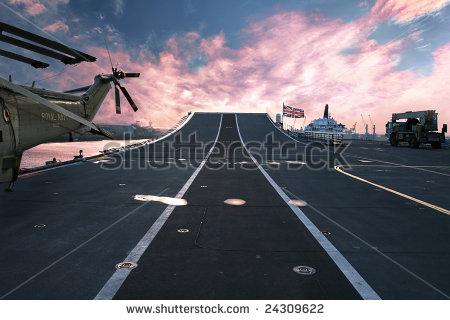 stock-photo-on-top-of-hms-ark-royal-aircraft-carrier-and-flagship-of-the-british-royal-navy-at-sunset-24309622.jpg