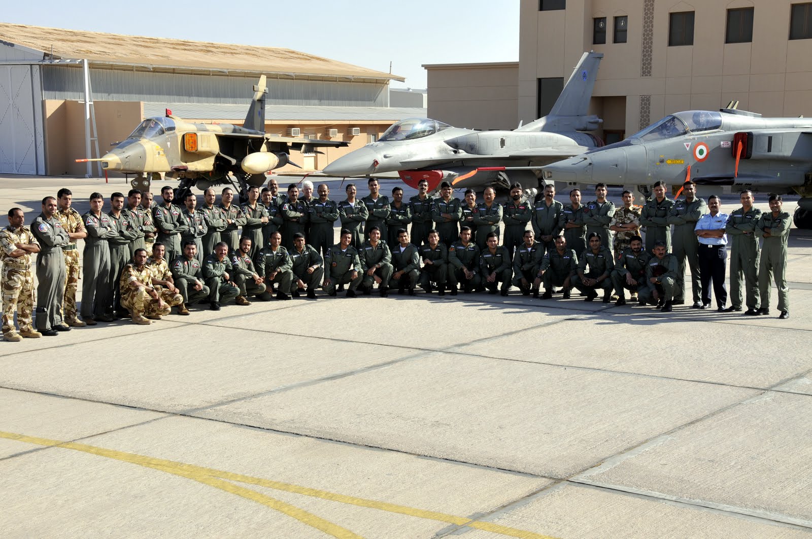IAF-RAFO+OFFICERS+PARTICIPATING+IN+EX-EASTERN+BRIDGE+POSE+AHEAD+OF+JAGUARS+AND+A+F-16+AT+THUMRAIT,+OMAN-751094.jpg