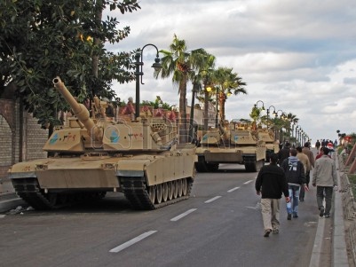 8956166-alexandria-egypt--january-28-2011--army-tanks-protecting-the-city-during-the-demonstrations.jpg