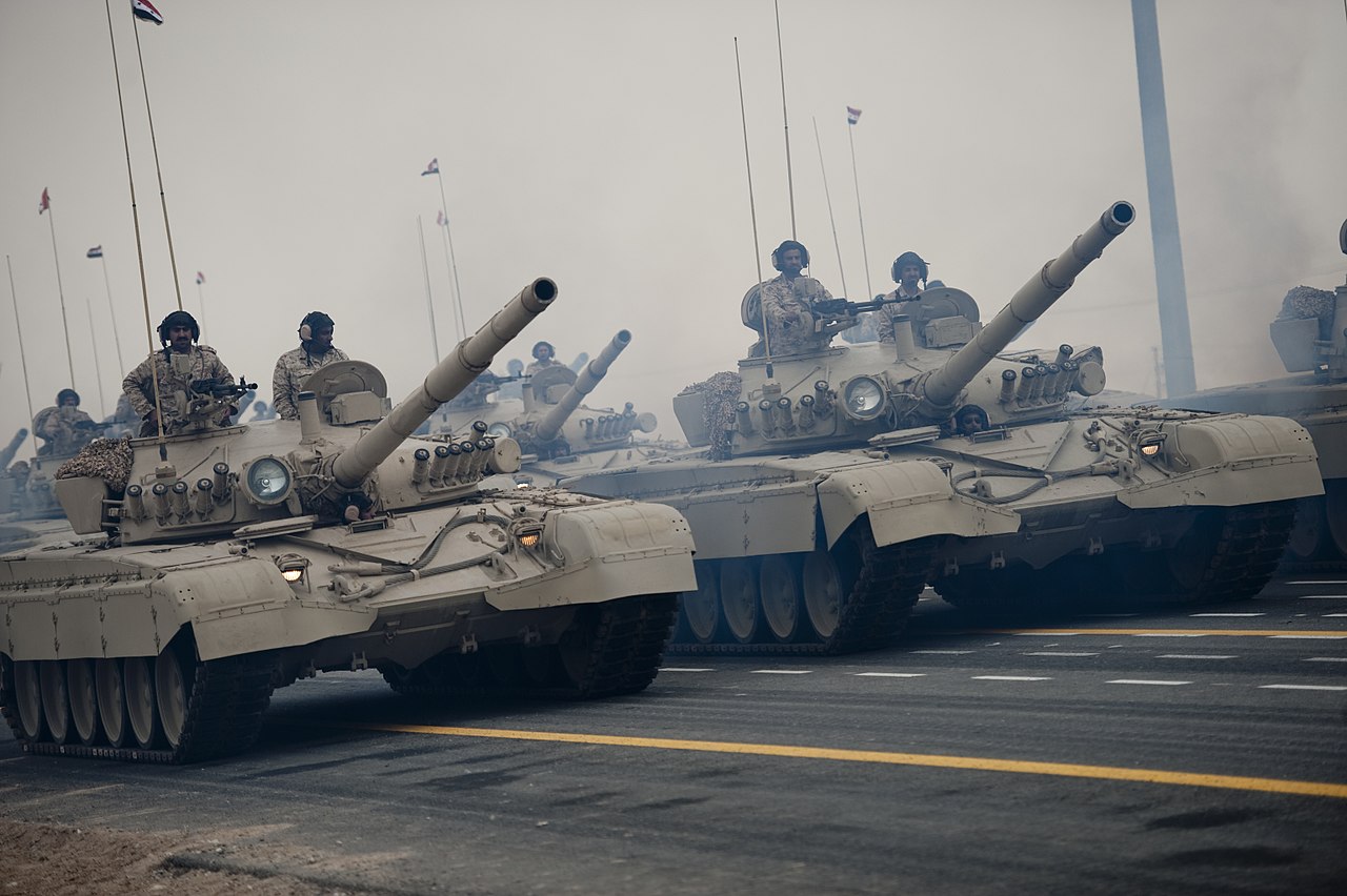 1280px-M-84AB-tanks_in_Kuwait_during_a_parade.jpg