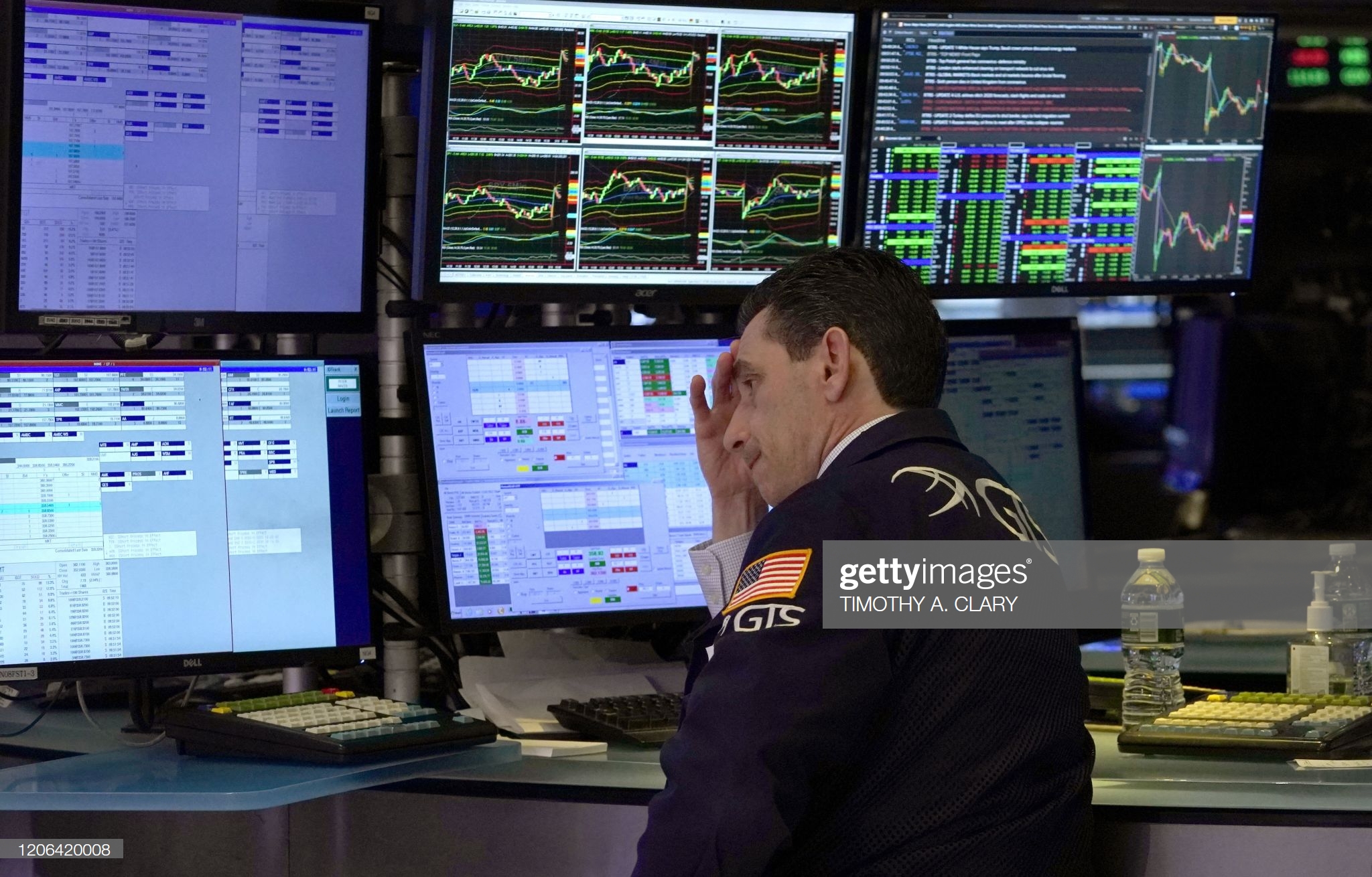 traders-work-on-the-floor-of-the-new-york-stock-exchange-during-the-picture-id1206420008