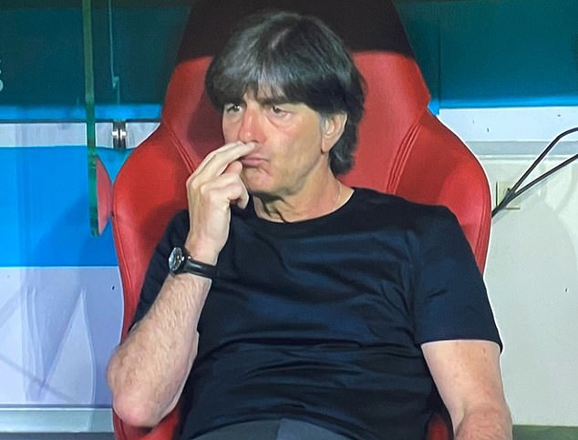 44288909-9691919-Germany_boss_Joachim_Low_was_seemingly_caught_sniffing_his_finge-m-24_1623834595108.jpg