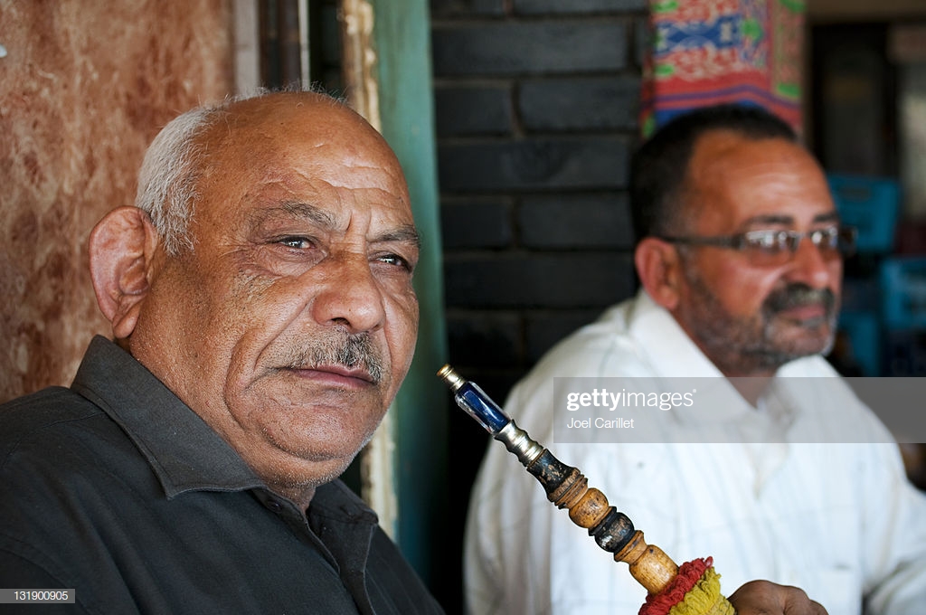 arab-men-and-hookah-in-port-said-egypt-picture-id131900905